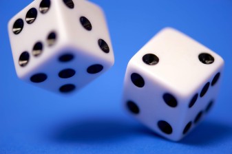 A risk management plan without a risk evaluation process is like rolling the dice. Picture of two dice. 